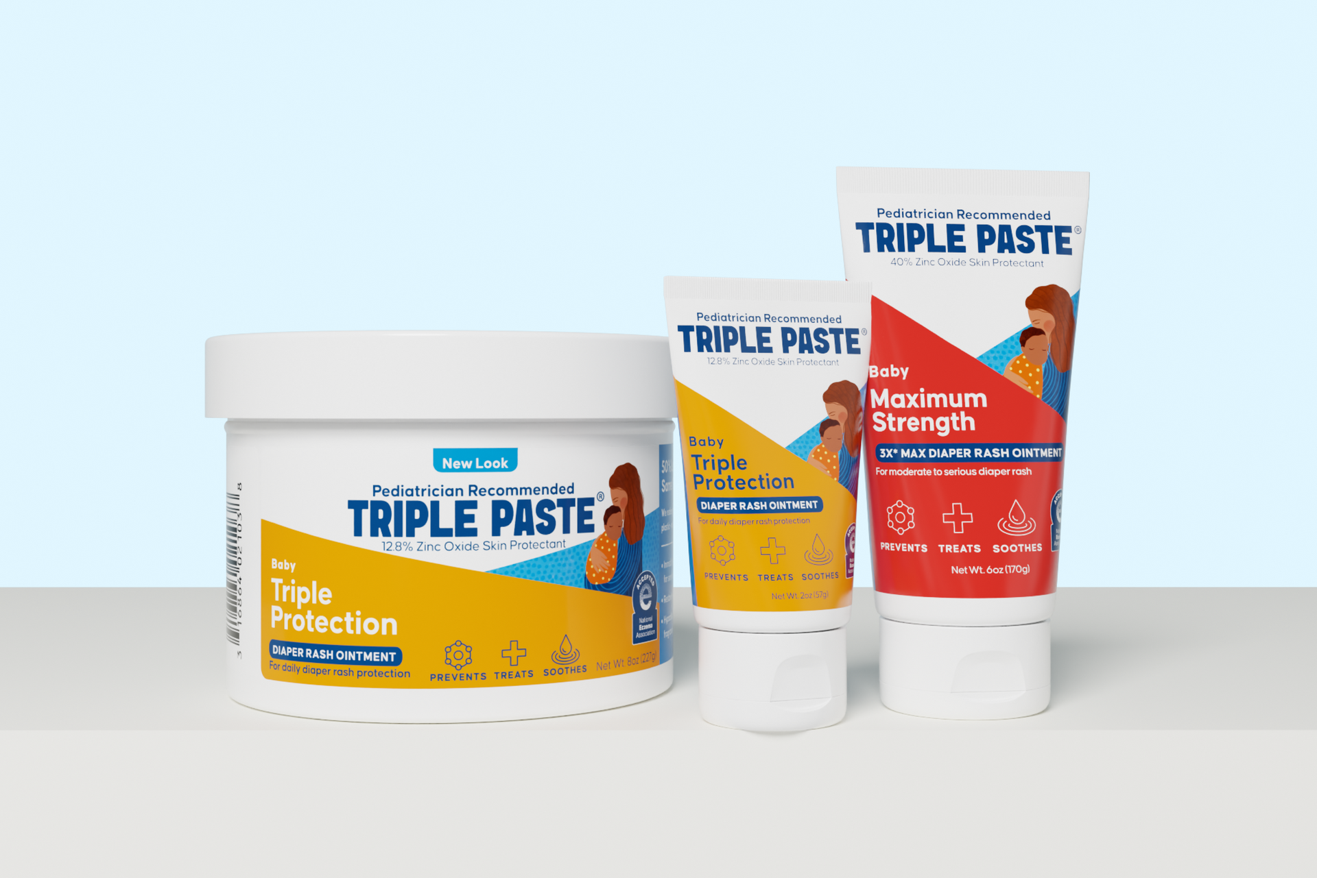 Three containers of Triple Paste on a light gray background